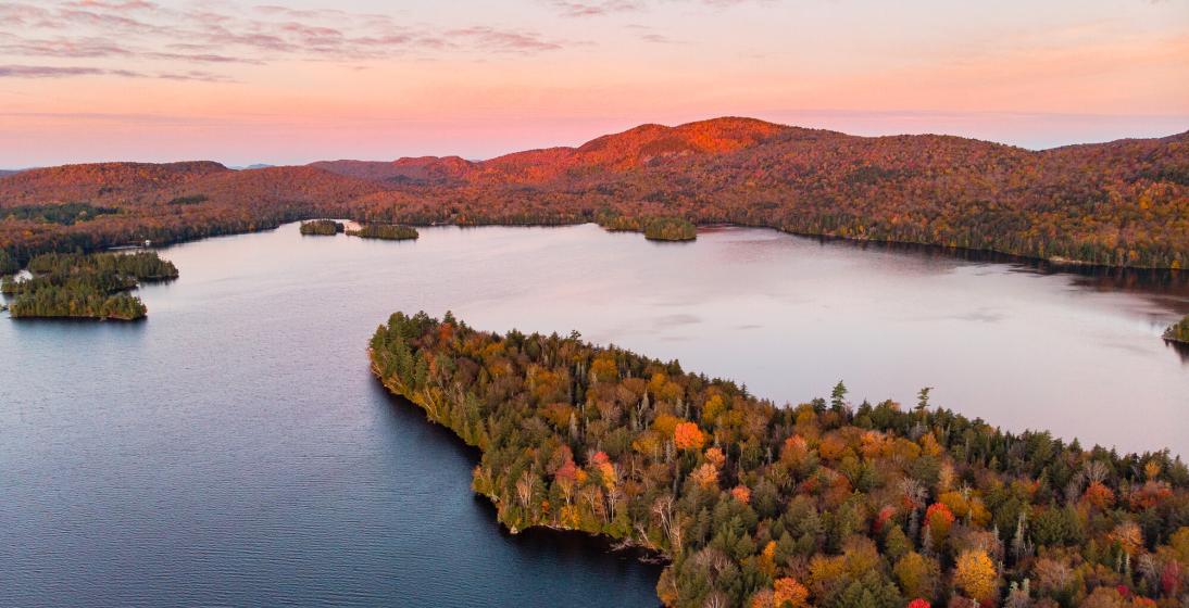 An aerial view of Blue Mountain Lake in the fall.