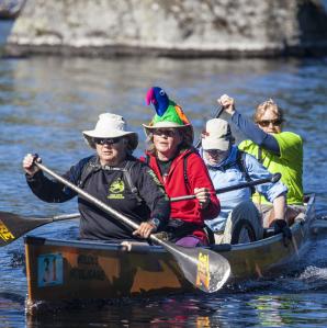 group of four paddlers in a boat