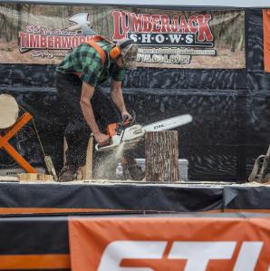 A man in a chainsaw competition