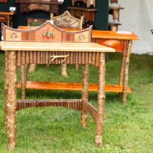 Several different end tables made from wood