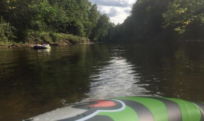Floating down a river on tubes