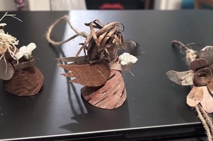 Little figures and flowers made from birch bark