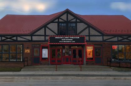 a photo of the movie theater taken outside in front of the building