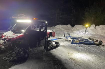 A mini groomer working at night