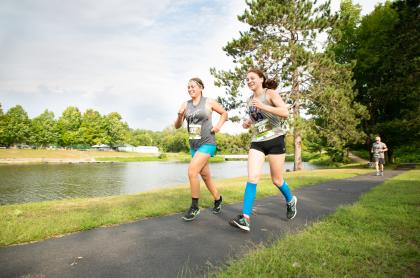Two girls running in a race