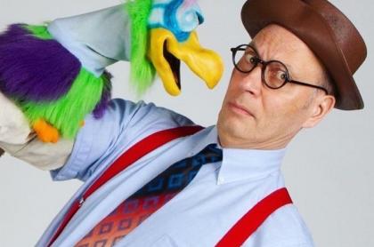 the great and powerful dave using a puppet and being silly