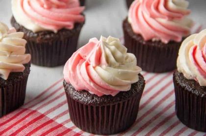 chocolate cupcakes with white/ red swirled frosting