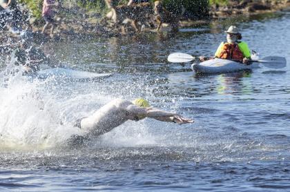 Tinman athlete dives into Raquette Pond