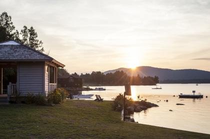 One of the finest places to watch the sunset is Blue Mountain Lake Beach.