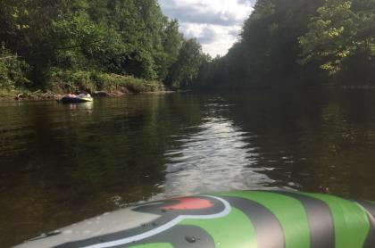 Floating down a river on tubes
