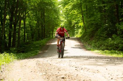 A cyclist on a gravel road