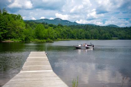 A dock into a scenic lake