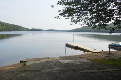 The Eighth Lake boat launch has a hard surface ramp and pier.