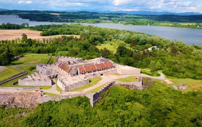 A revolutionary war fort on the edge of a lake.