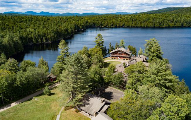 Aerial view of an Adirondack Great Camp in the summer