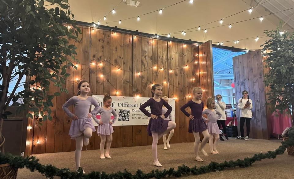 Several little girls performing ballet/dance on stage at Oak Mt