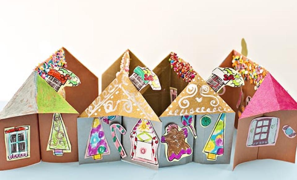 several paper gingerbread houses hand made and colored by children