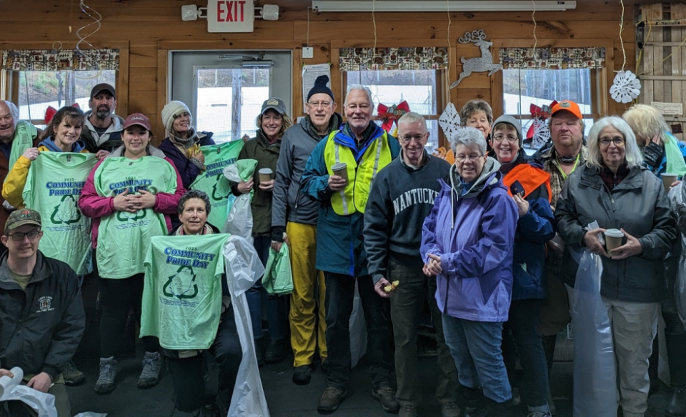 people from the community who helped to clean up their neighborhood- group photo