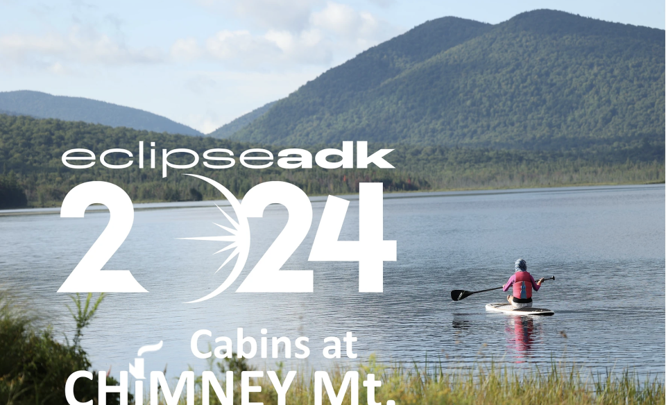 poster for event picturing a kayaker with mountains in the background what you see from the cabins at Chimney Mountain