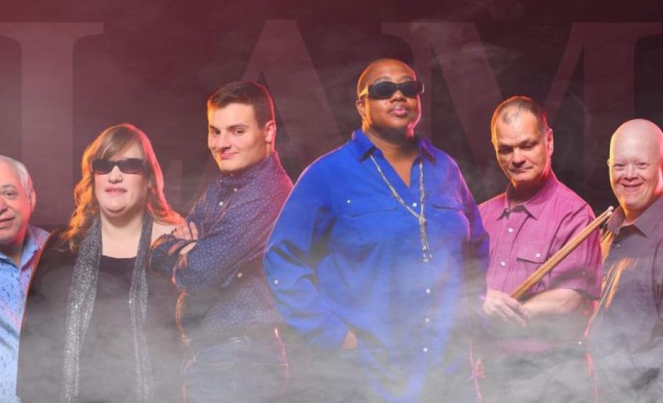 A photo of the band members of Flame