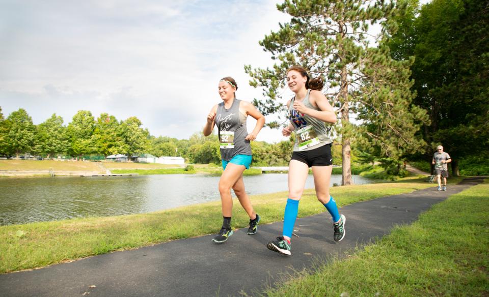 Two girls running in a race