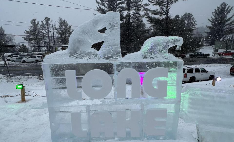 An ice sculture with the words Long Lake