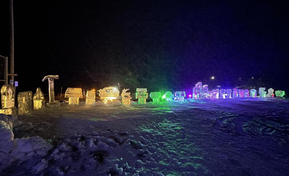 A night time look at all the ice scultures aglow with different colored lights