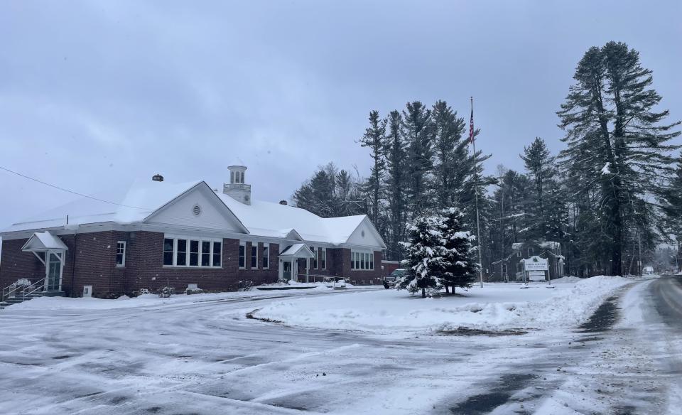 A photo of the church building in winter time with snow all around