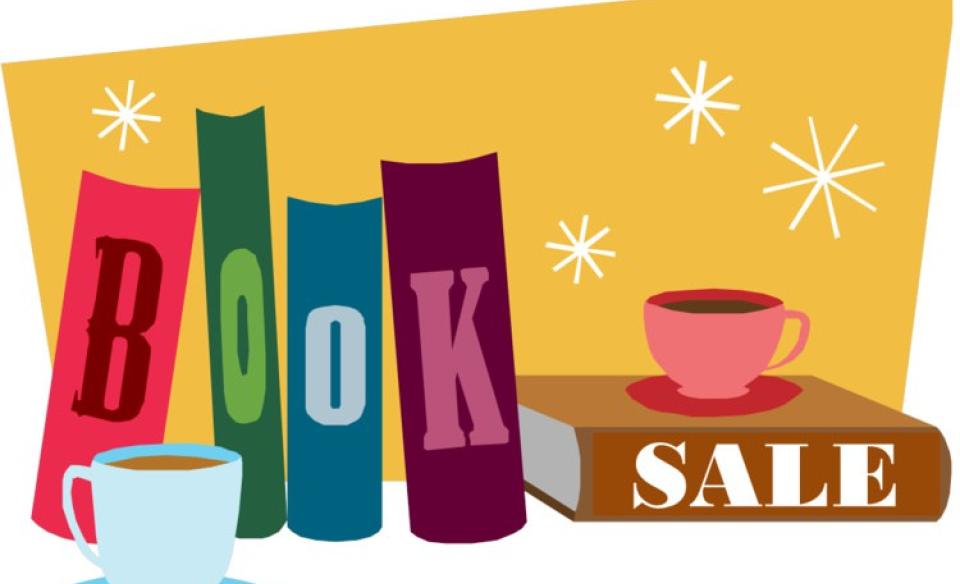 A cartoon image of four books standing upright