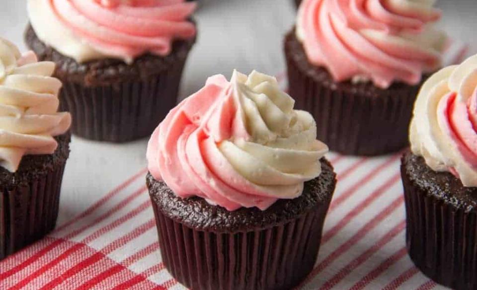 chocolate cupcakes with white/ red swirled frosting