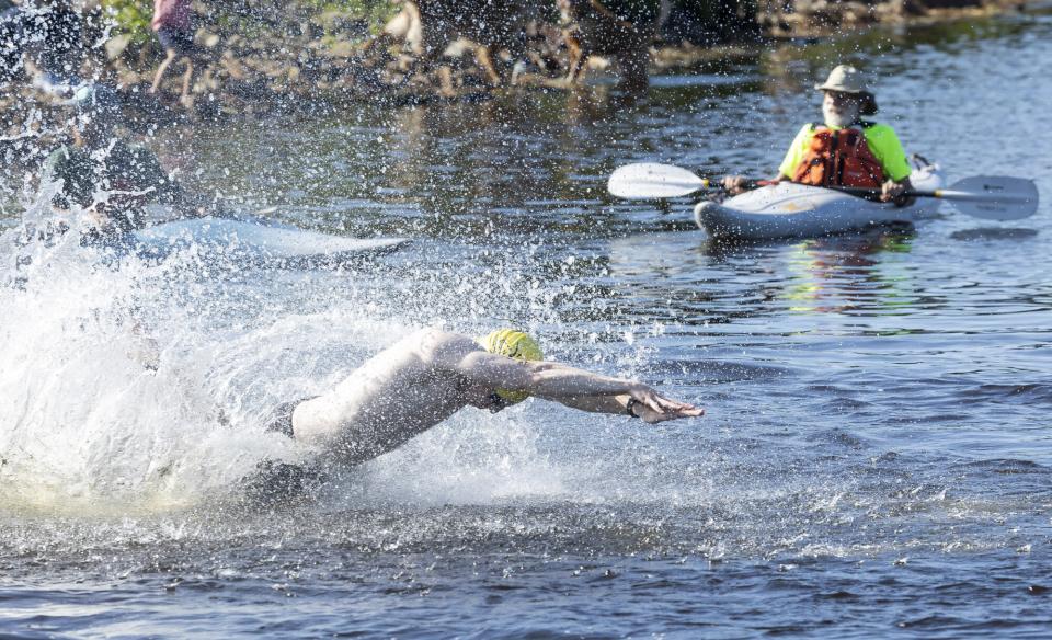 Tinman athlete dives into Raquette Pond