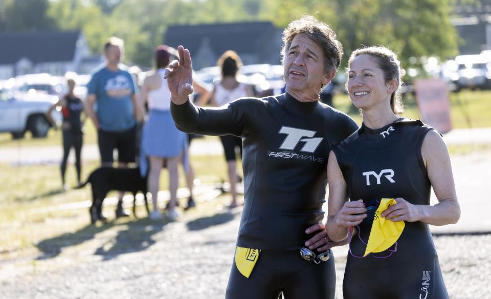 Two Tinman athletes chat before the start of the event.