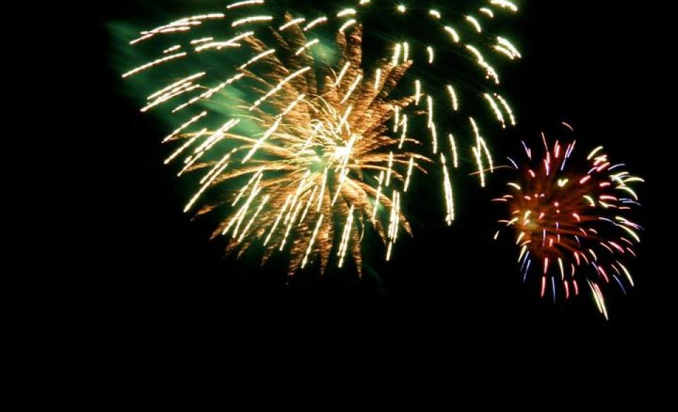 Fireworks bursting in a black sky