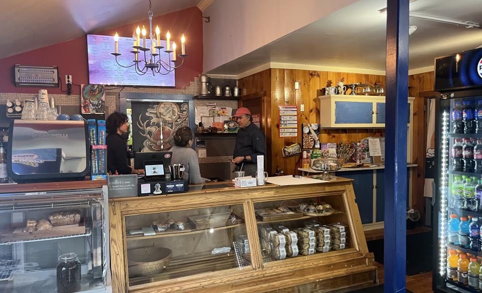 The inviting front counter is stuffed with delicious options and warm lighting