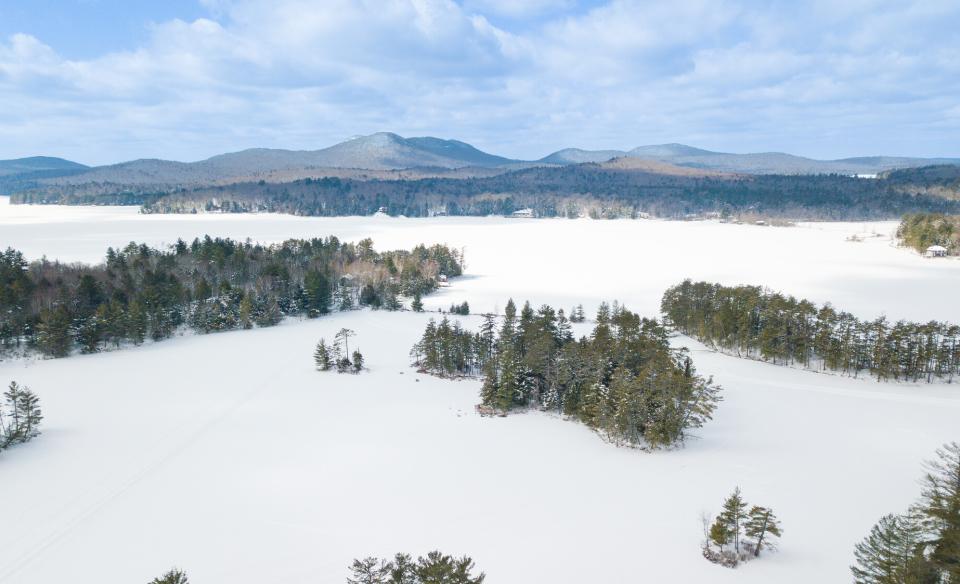 Long Lake and the Spill Way Trail seen from the air in the winter.