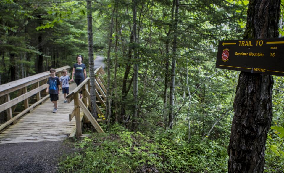 The trail includes bridges over deep gorges and wetlands.