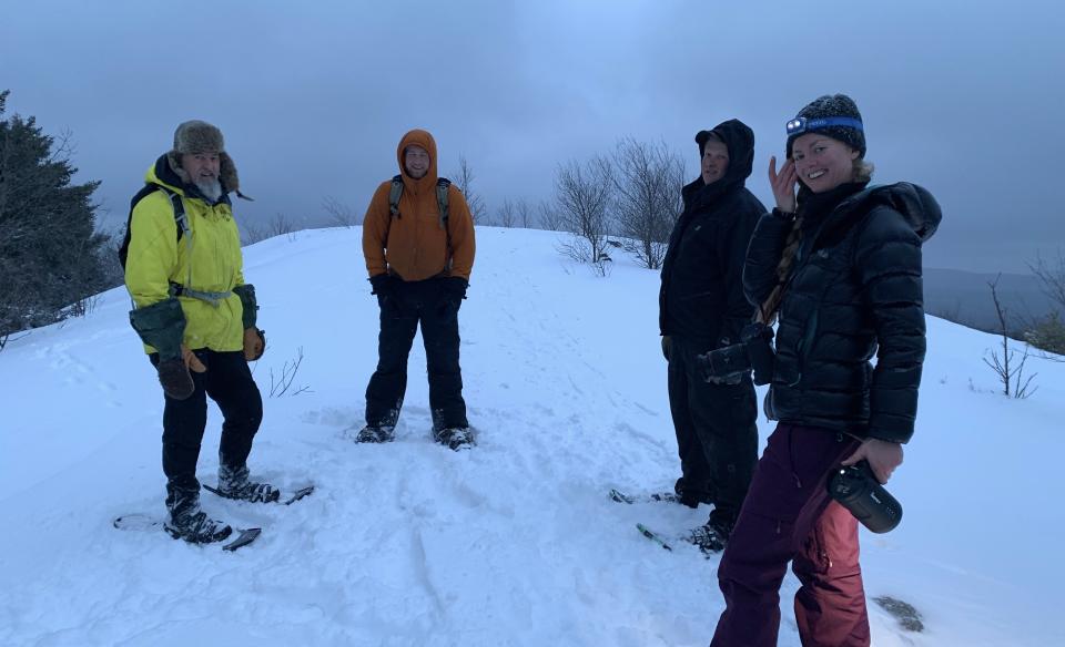 Hike up with headlamps to watch the sun rise from the peak