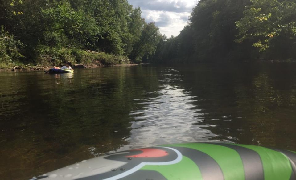 Floating down a river on tubes