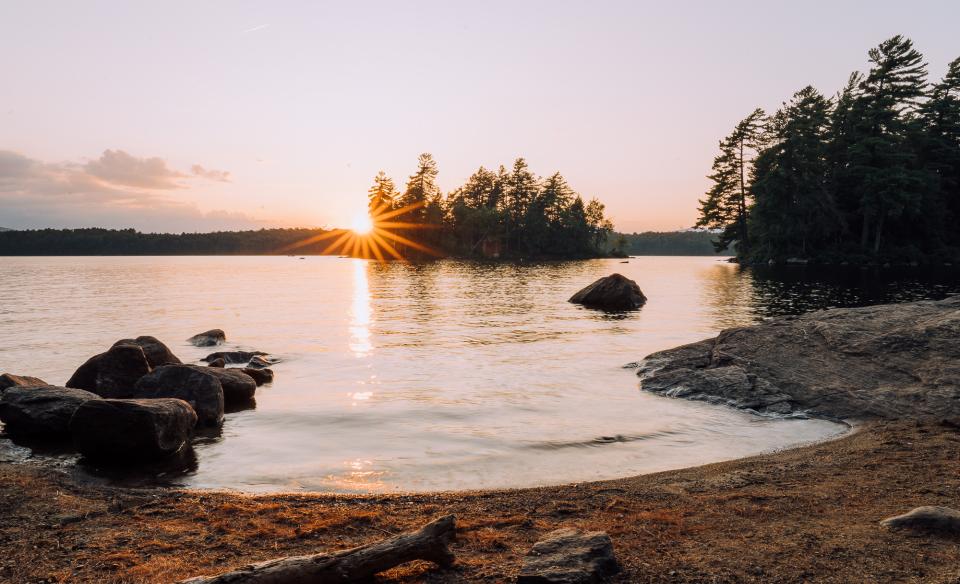 A shoreline during sunset