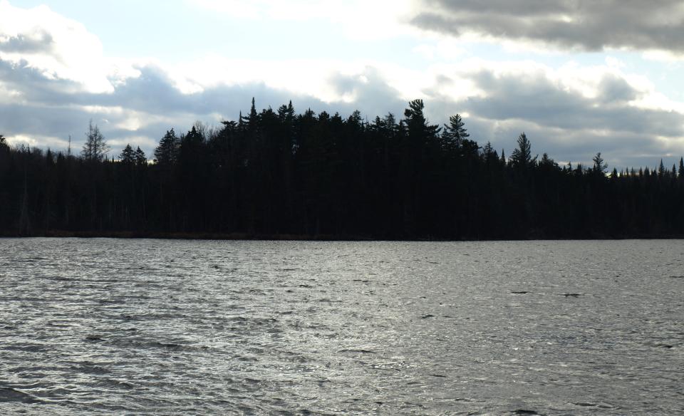 The view of a small lake-side hill near Mud Pond and McRorie Lake
