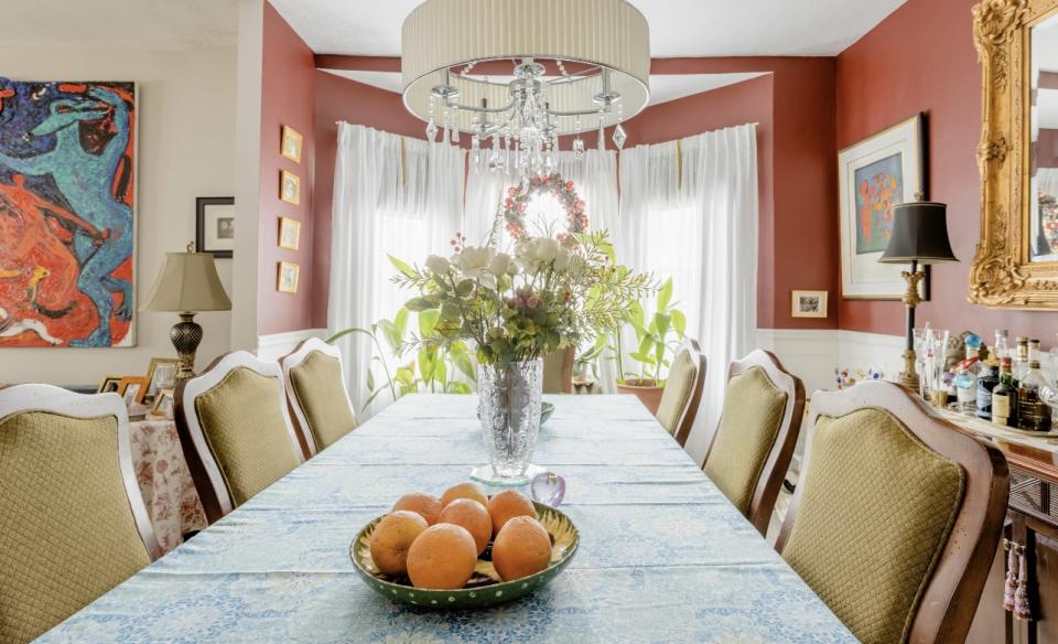 over-sided chair and many cozy throw pillows.