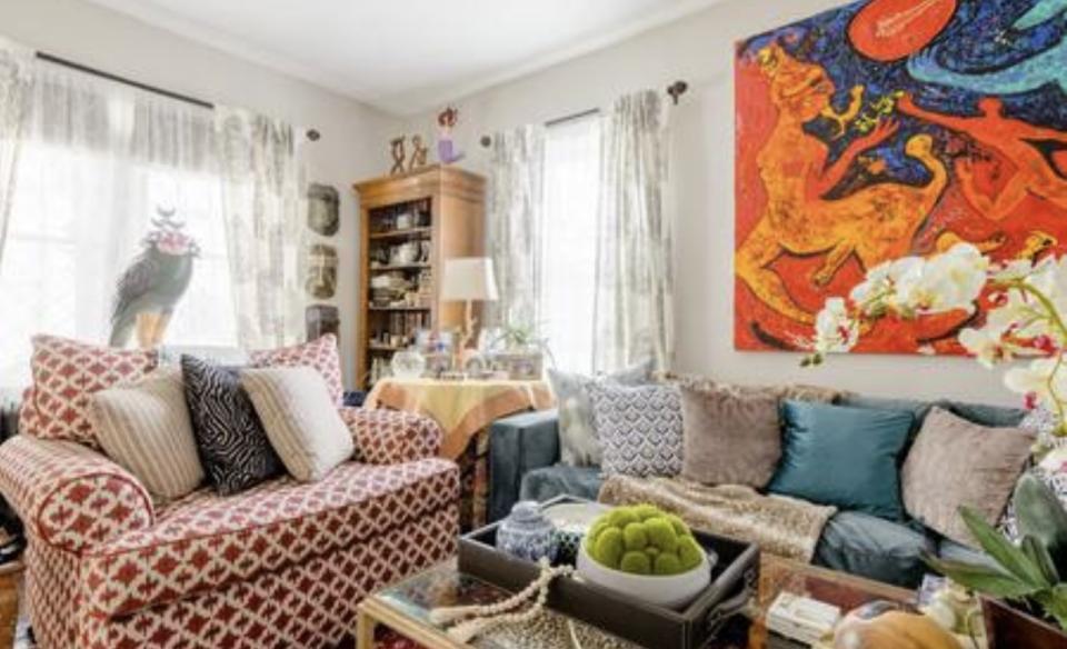 A sitting room with large couch