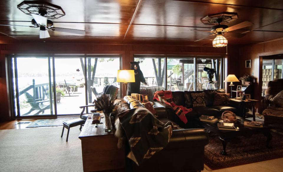 Large stone fireplace in the den