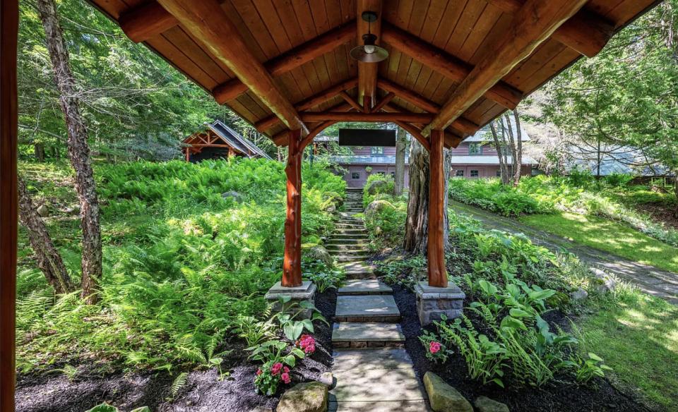 Shaded driveway through rocky canyon
