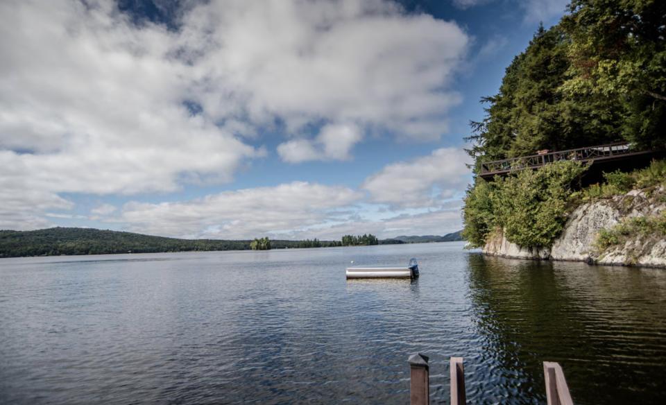 A different angle of the couches and windows of the den
