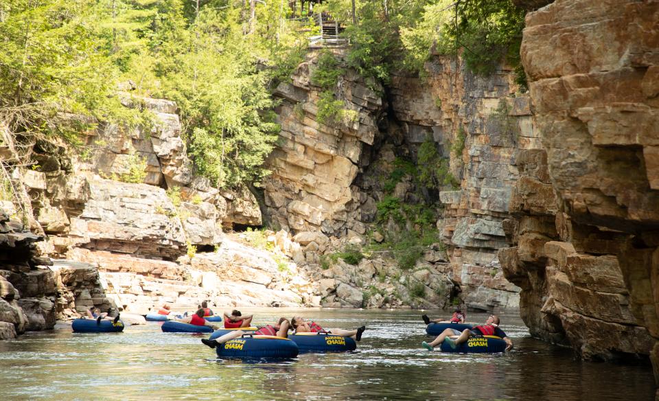 Float down the river in style with Ausable Chasm custom rafts