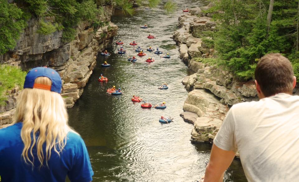 Floating down the river surrounded by the towering walls of the chasm